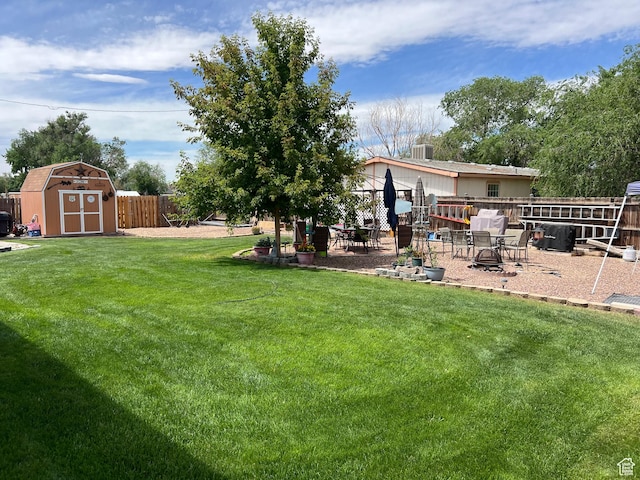 696 S 100 E, Roosevelt, UT 84066 - fenced backyard featuring a storage shed and a patio area