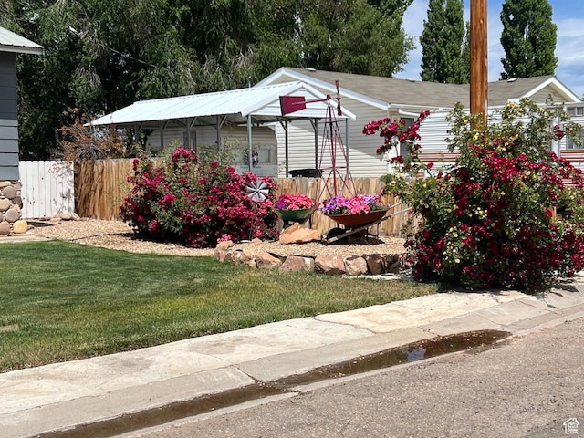 696 S 100 E, Roosevelt, UT 84066 - view of front of house featuring a carport