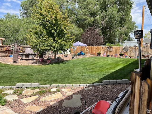 696 S 100 E, Roosevelt, UT 84066 - fenced backyard with a playground