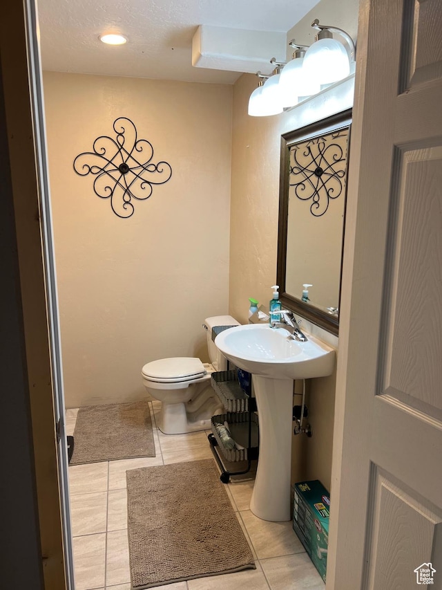 696 S 100 E, Roosevelt, UT 84066 - half bath with toilet and tile patterned floors