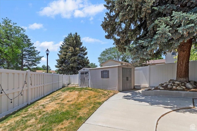 1430 W 6720 S, West Jordan, UT 84084 - fenced backyard with a patio and a storage shed