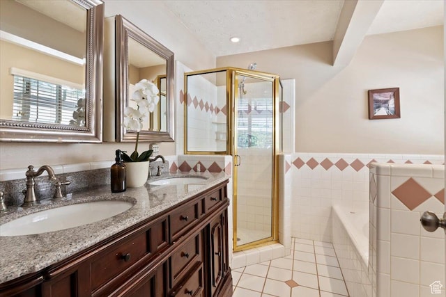1430 W 6720 S, West Jordan, UT 84084 - full bath with tile walls, tile patterned flooring, a shower stall, a bath, and double vanity