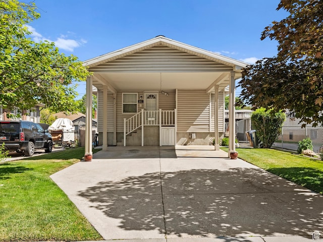 841 E Ramona Ave, Salt Lake City, UT 84105 - view of front of property with a front yard and concrete driveway