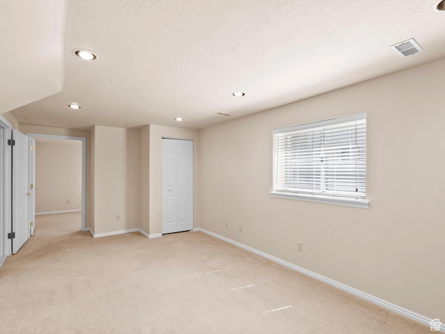 841 E Ramona Ave, Salt Lake City, UT 84105 - spare room with light colored carpet, recessed lighting, and a textured ceiling