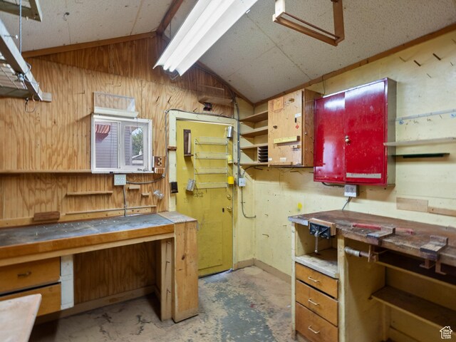 841 E Ramona Ave, Salt Lake City, UT 84105 - kitchen with vaulted ceiling, wood walls, and open shelves