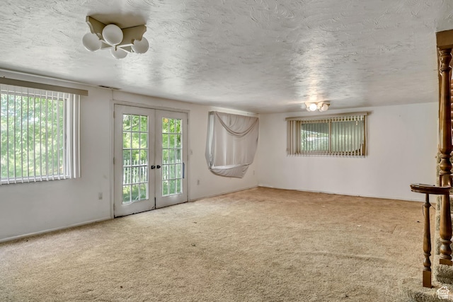 787 E 4800 S, Murray, UT 84107 - empty room featuring carpet, french doors, and a textured ceiling