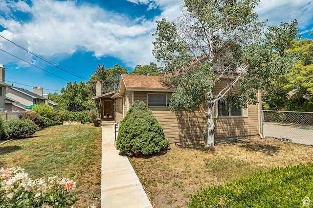 787 E 4800 S, Murray, UT 84107 - view of front of home featuring a chimney