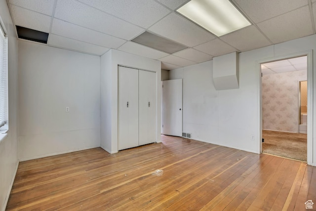 787 E 4800 S, Murray, UT 84107 - unfurnished bedroom featuring a paneled ceiling, light wood finished floors, ensuite bath, and a closet