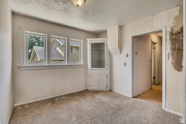 787 E 4800 S, Murray, UT 84107 - carpeted spare room with a textured ceiling and baseboards