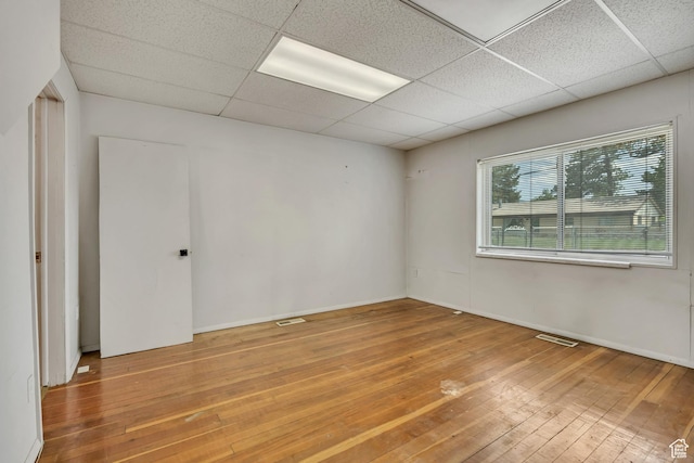 787 E 4800 S, Murray, UT 84107 - unfurnished room featuring hardwood / wood-style floors and a paneled ceiling