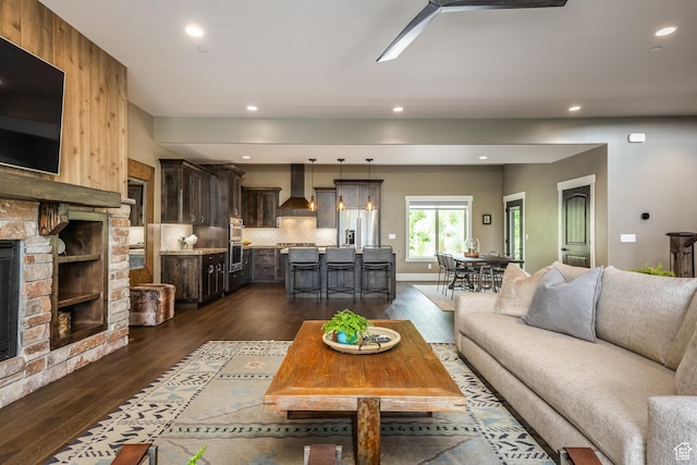 1773 E Longview Dr, Hideout, UT 84036 - living area featuring dark wood finished floors, a fireplace, and recessed lighting