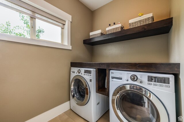 1773 E Longview Dr, Hideout, UT 84036 - washroom featuring separate washer and dryer and light tile patterned floors