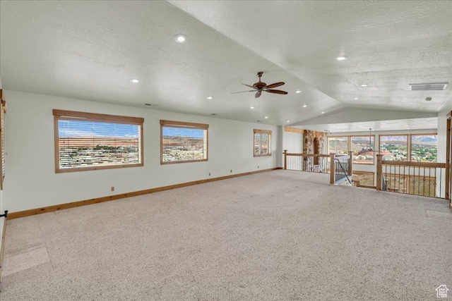 393 N Crestline Cir, St George, UT 84790 - unfurnished living room featuring ceiling fan, vaulted ceiling, carpet, recessed lighting, and a textured ceiling