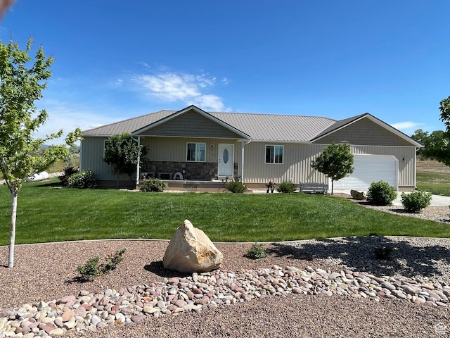 2156 W 4750 N, Roosevelt, UT 84066 - single story home featuring a front yard, an attached garage, a metal roof, and stone siding