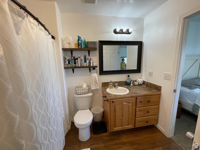 2156 W 4750 N, Roosevelt, UT 84066 - full bathroom with wood finished floors, vanity, connected bathroom, and a shower with curtain