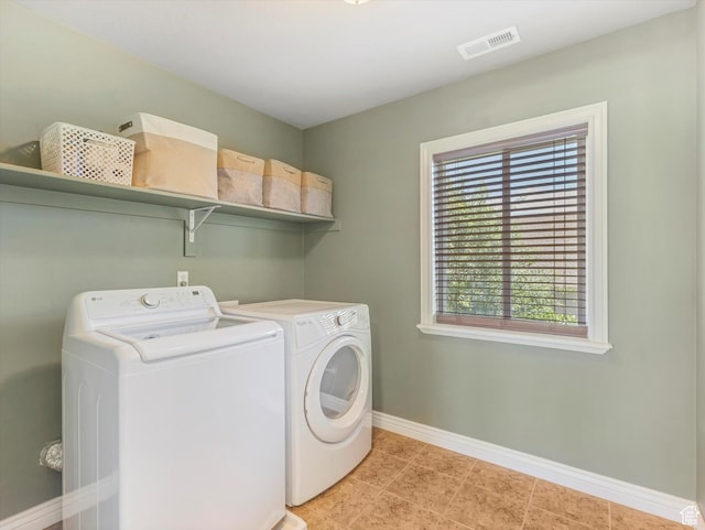 430 E 2010 S, Heber City, UT 84032 - laundry area with washer and dryer and light tile patterned flooring