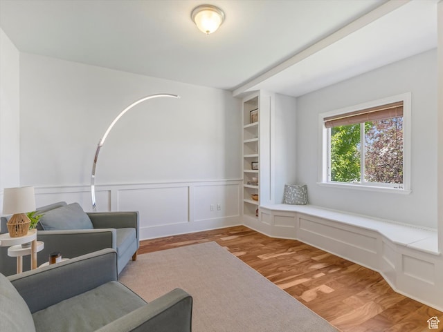 430 E 2010 S, Heber City, UT 84032 - sitting room featuring light wood-type flooring, a decorative wall, and wainscoting
