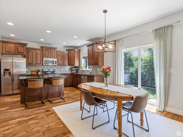 430 E 2010 S, Heber City, UT 84032 - dining area with plenty of natural light, a chandelier, light wood-style floors, and recessed lighting