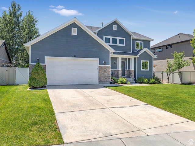 430 E 2010 S, Heber City, UT 84032 - craftsman house with stone siding, an attached garage, a gate, and concrete driveway