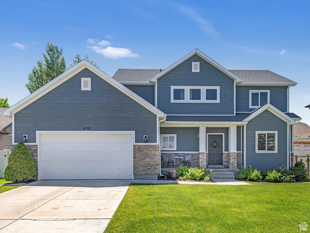 430 E 2010 S, Heber City, UT 84032 - craftsman inspired home featuring a front yard, stone siding, and concrete driveway