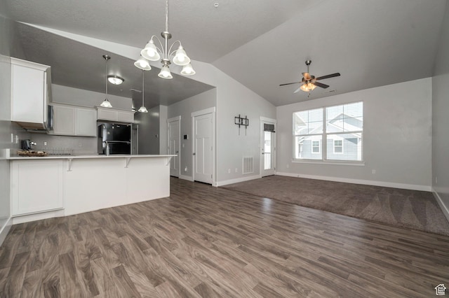 55 W Silver Springs Dr Unit F, Vineyard, UT 84059 - kitchen featuring freestanding refrigerator, open floor plan, vaulted ceiling, a ceiling fan, and a peninsula