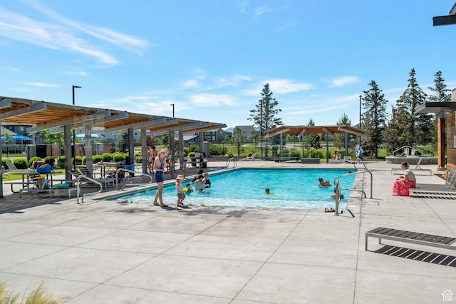 55 W Silver Springs Dr Unit F, Vineyard, UT 84059 - community pool featuring a pergola and a patio area