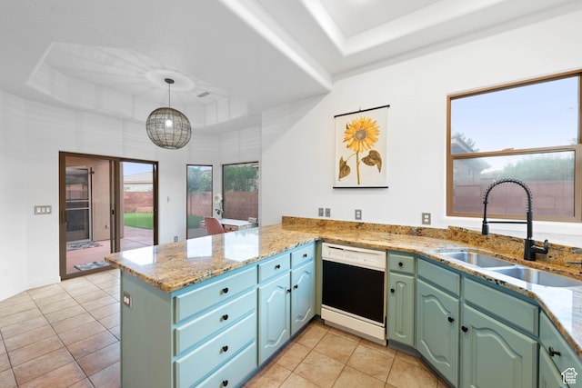 250 N Snow Canyon Dr Unit 16, Ivins, UT 84738 - kitchen featuring a tray ceiling, dishwasher, a peninsula, and light tile patterned flooring