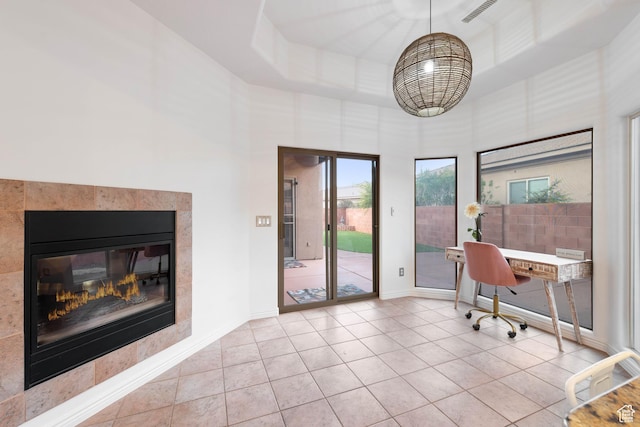 250 N Snow Canyon Dr Unit 16, Ivins, UT 84738 - office with tile patterned flooring, a towering ceiling, and a tiled fireplace