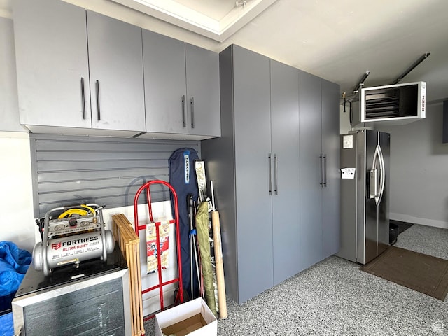 3052 N Mountain Rd, North Ogden, UT 84414 - garage featuring stainless steel fridge and a heating unit
