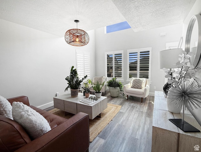 3052 N Mountain Rd, North Ogden, UT 84414 - living room with a textured ceiling and wood finished floors