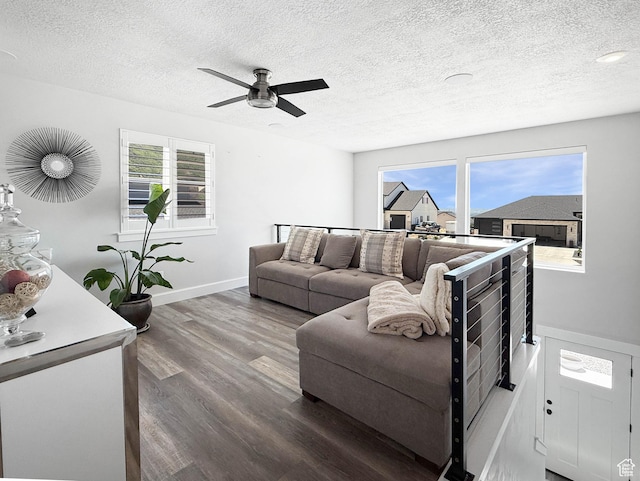3052 N Mountain Rd, North Ogden, UT 84414 - living area with wood finished floors, a textured ceiling, and a ceiling fan