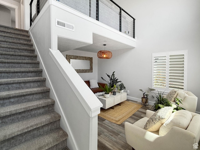 3052 N Mountain Rd, North Ogden, UT 84414 - stairway with wood finished floors and a high ceiling