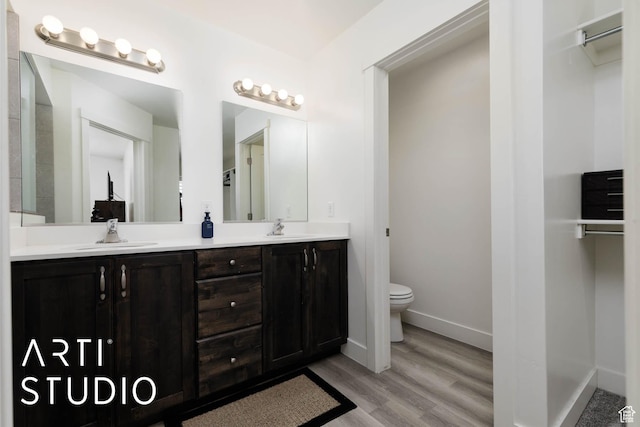 6297 S Zelda Dr, St George, UT 84790 - full bathroom featuring double vanity and wood finished floors