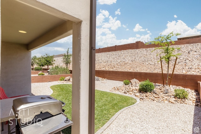 6297 S Zelda Dr, St George, UT 84790 - fenced backyard featuring a patio area