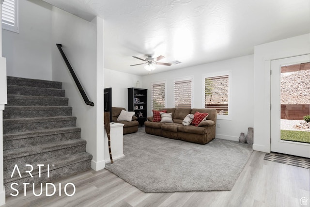 6297 S Zelda Dr, St George, UT 84790 - living room featuring wood finished floors, stairway, and a ceiling fan