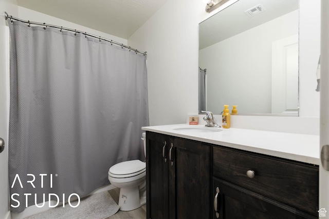 6297 S Zelda Dr, St George, UT 84790 - bathroom featuring vanity, curtained shower, and wood finished floors