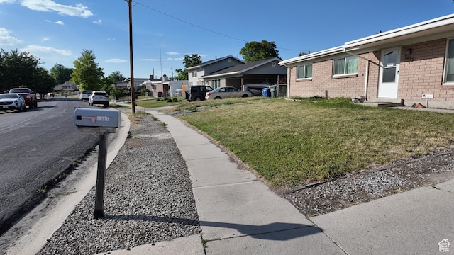 2617 S Ridgeland W, West Valley City, UT 84119 - view of green lawn featuring a residential view