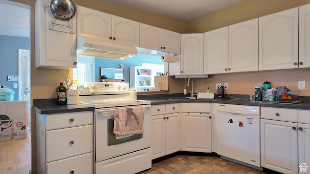 2617 S Ridgeland W, West Valley City, UT 84119 - kitchen featuring white appliances, under cabinet range hood, white cabinets, and dark countertops