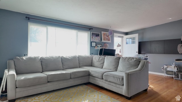 2617 S Ridgeland W, West Valley City, UT 84119 - living room with wood finished floors and baseboards