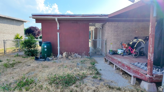 2617 S Ridgeland W, West Valley City, UT 84119 - rear view of property with brick siding and a gate