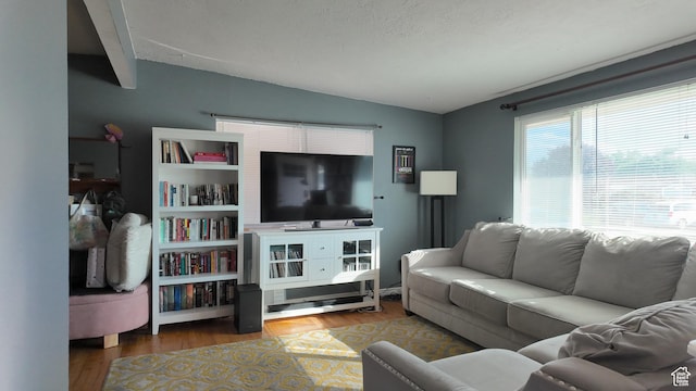 2617 S Ridgeland W, West Valley City, UT 84119 - living area featuring lofted ceiling and wood finished floors