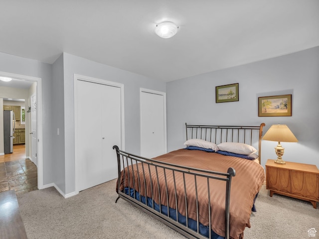 789 Richmond Dr, Park City, UT 84098 - bedroom with freestanding refrigerator, multiple closets, and carpet floors