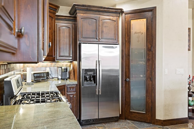 1883 S Purple Sage Dr, Washington, UT 84780 - kitchen featuring stainless steel appliances and tasteful backsplash