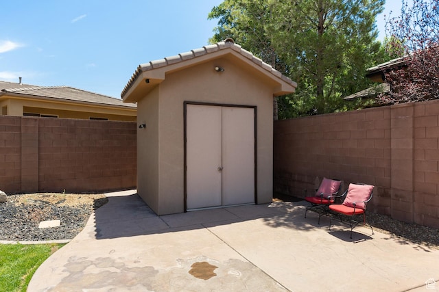 1883 S Purple Sage Dr, Washington, UT 84780 - view of shed featuring a fenced backyard