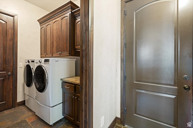 1883 S Purple Sage Dr, Washington, UT 84780 - laundry area featuring separate washer and dryer, stone tile flooring, and cabinet space