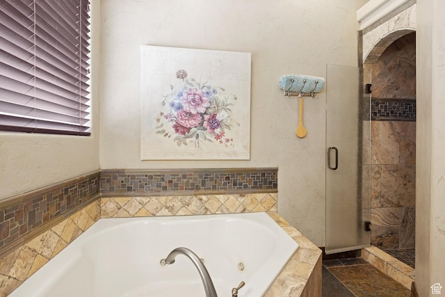 1883 S Purple Sage Dr, Washington, UT 84780 - full bathroom with a jetted tub and a stall shower