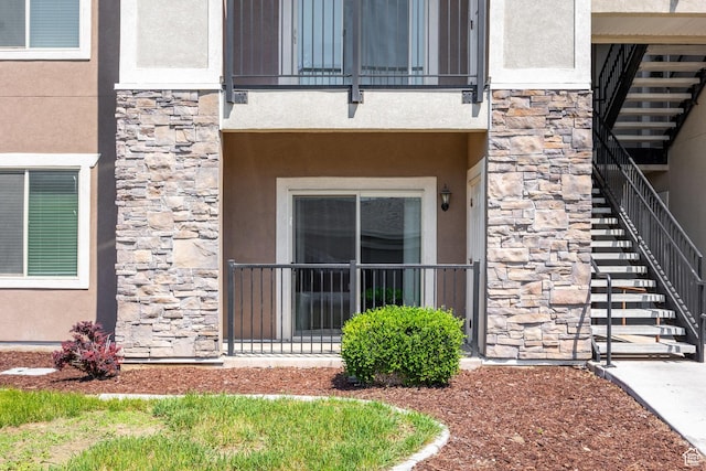 136 W Spring Hill Way Unit 801, Saratoga Springs, UT 84045 - property entrance featuring stone siding and stucco siding