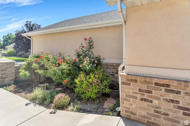1408 W Westbridge Dr S, Provo, UT 84601 - view of home's exterior with stucco siding and roof with shingles