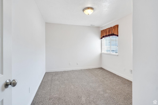 1408 W Westbridge Dr S, Provo, UT 84601 - carpeted spare room featuring baseboards and a textured ceiling