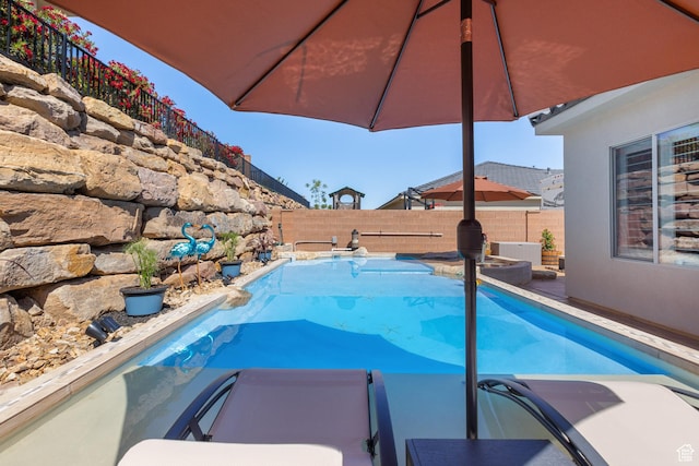 2723 S Varano Way, St George, UT 84770 - view of pool featuring a fenced backyard and a pool with connected hot tub